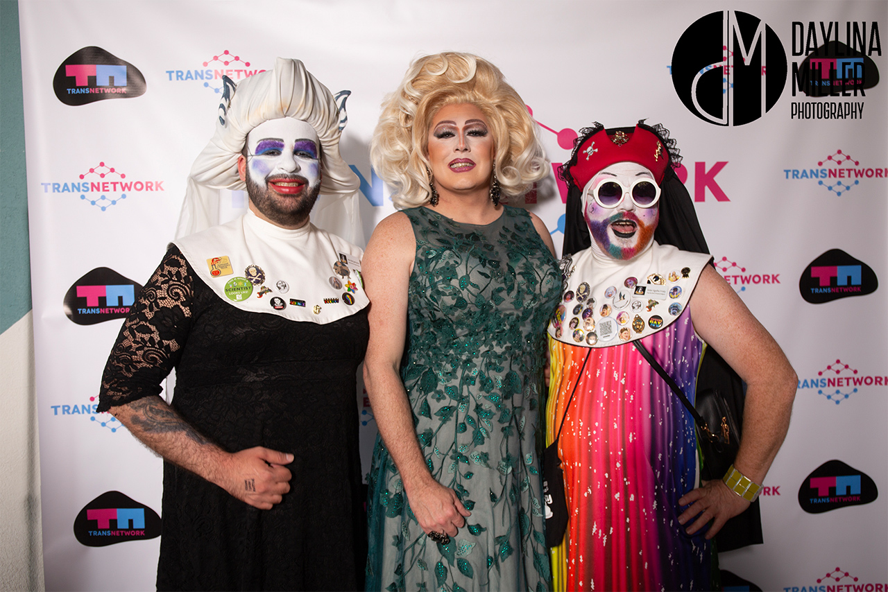 The Sisters of Perpetual Indulgence posing together at the UNI-Tea Dance, dressed in vibrant, unique outfits.