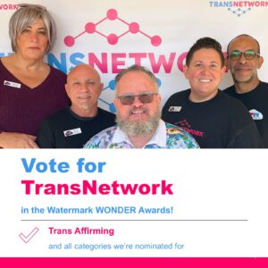 The TransNetwork team smiling in front of a branded backdrop. Text on the image reads: "Vote for TransNetwork in the Watermark WONDER Awards. Trans Affirming and all categories we’re nominated for"